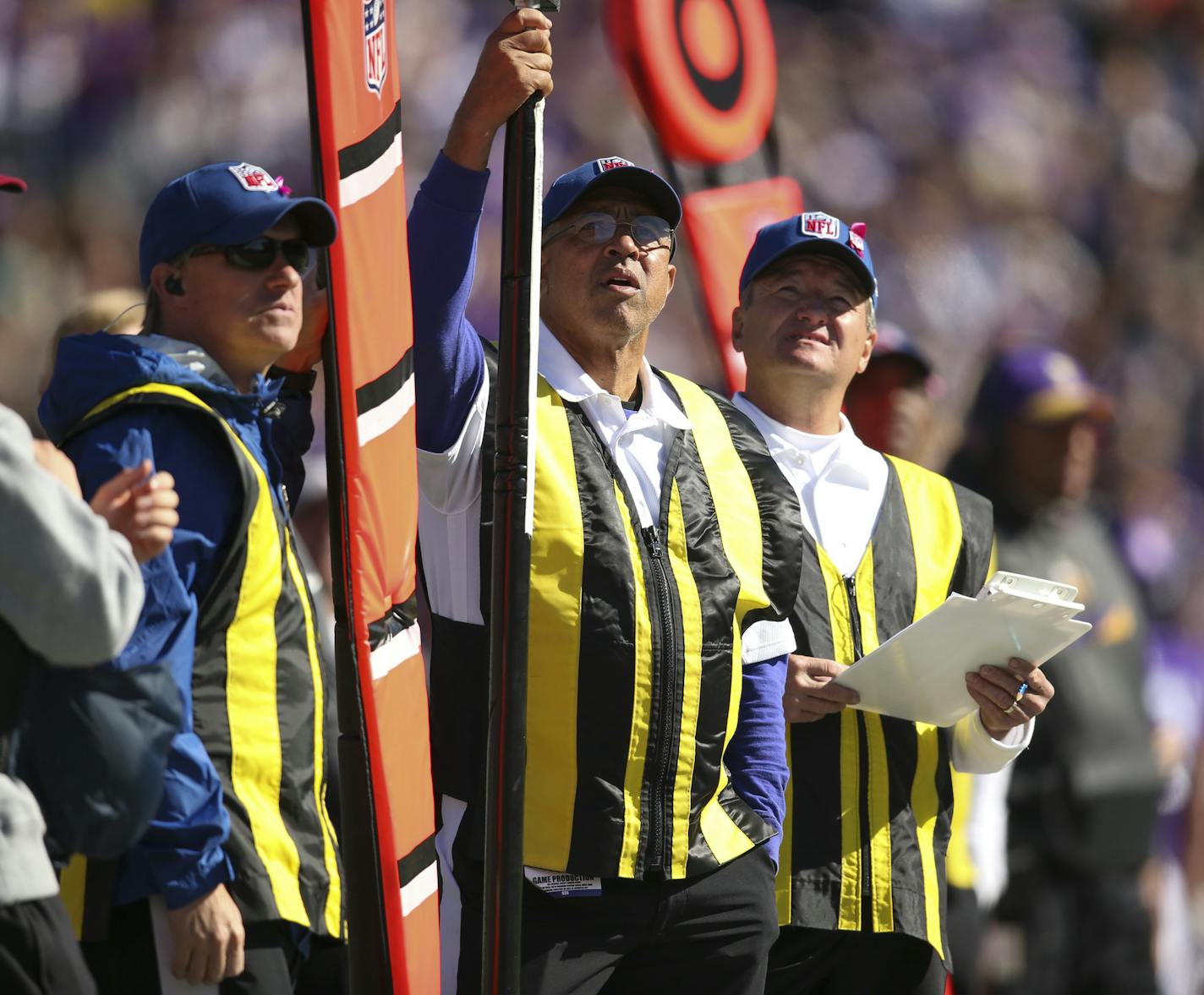 Members of the chain gang -- left to right, Jim Hawthorne, Greg McMoore and Dennis Anderson -- on the Vikings' sideline in the first quarter Sunday afternoon. ] JEFF WHEELER &#xef; jeff.wheeler@startribune.com The Minnesota Vikings eeked out a 16-10 win over the Kansas City Chiefs in an NFL football game Sunday afternoon, October 18, 2015 at TCF Bank Stadium in Minneapolis.