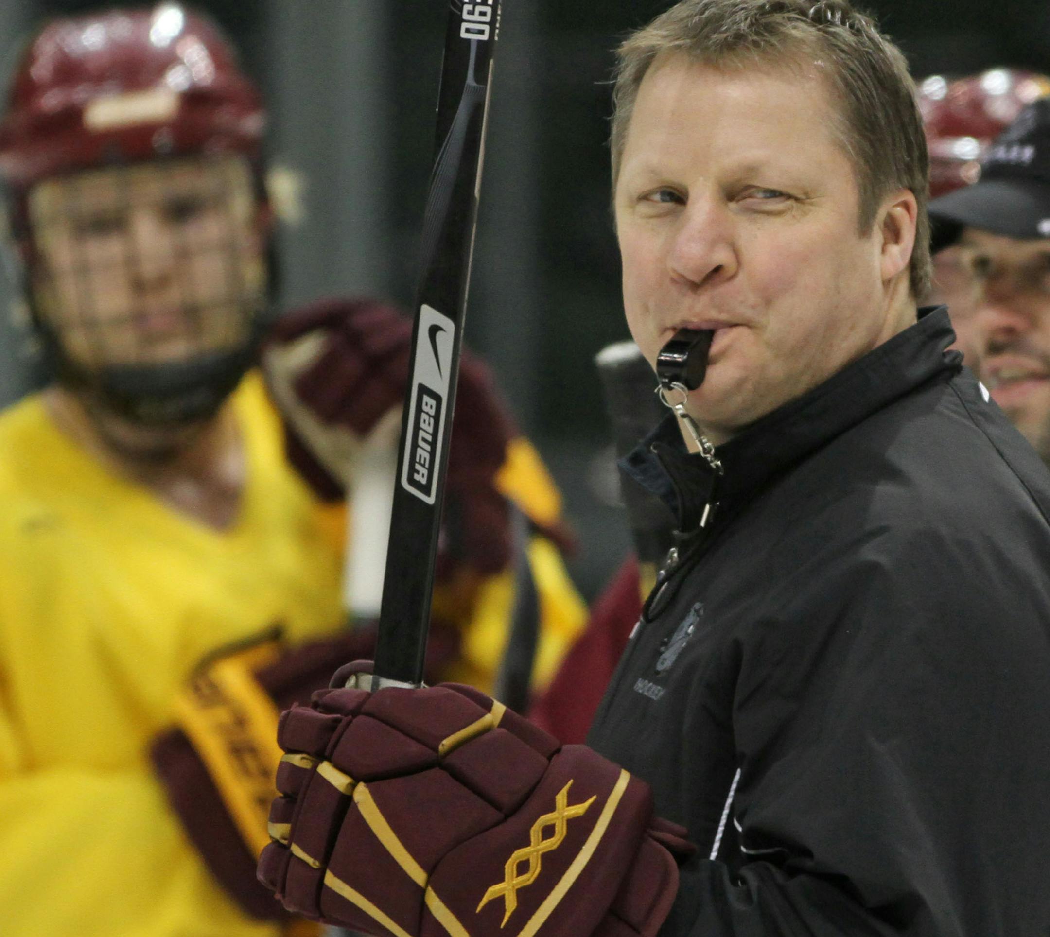 BRUCE BISPING ‚Ä¢ bbisping@startribune.com St. Paul, MN., Wednesday, 4/6/11] NCAA Frozen Four Practices. The University of Minnesota Bulldogs Head Coach Scott Sandelin ran drills during practice at the Xcel Center.