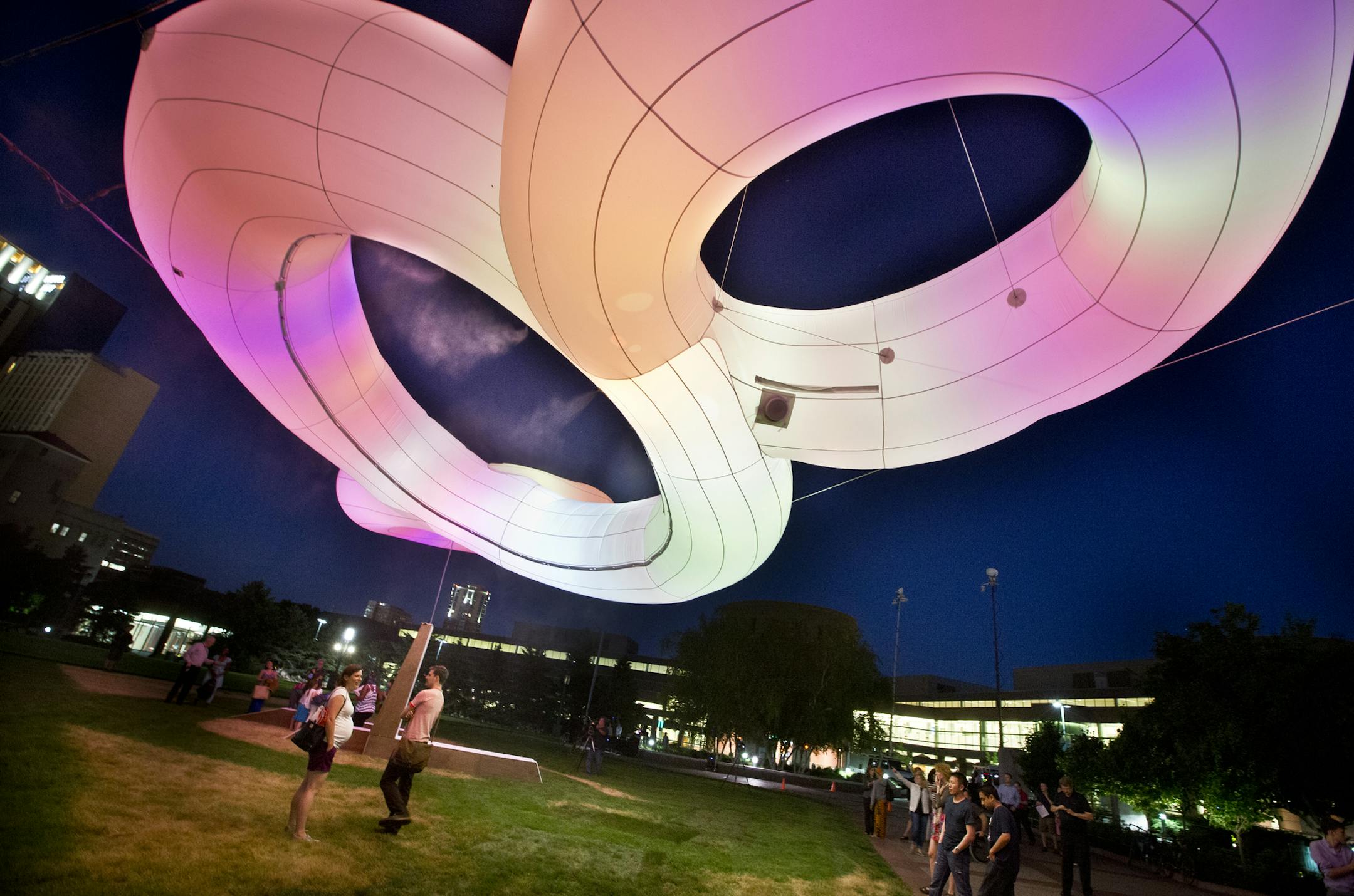 MIMMI is an acronym for a public-art sculpture that looks like 3 clouds, lit from inside by color-changing LED lights. it was the winning design for a contest sponsored by the city of Minneapolis and the Convention Center. It will be up all summer outside the Minneapolis Convention Center. Photographed on Thursday, June 13, 2013. ] (RENEE JONES SCHNEIDER * reneejones@startribune.com)