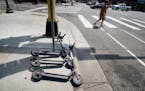 Three Bird scooters were on the sidewalk at 9th and Hennepin in downtown Minneapolis. ] GLEN STUBBE &#xef; glen.stubbe@startribune.com Tuesday, July 1