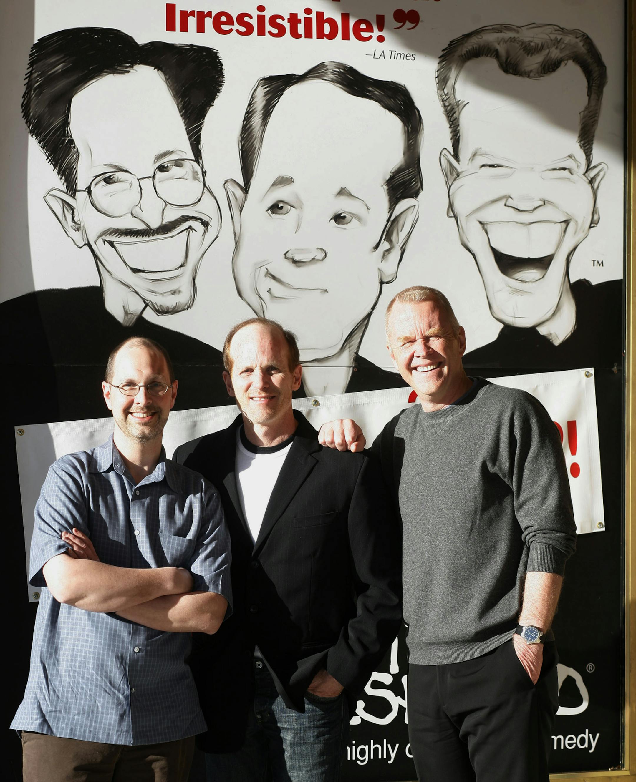 Original cast members of the long-running "Triple Espresso" -- from left, Michael Pearce Donley, Bill Arnold and Bob Stromberg -- stand in front of the Music Box theater on Nicollet Ave. in downtown Minneapolis in 2008.