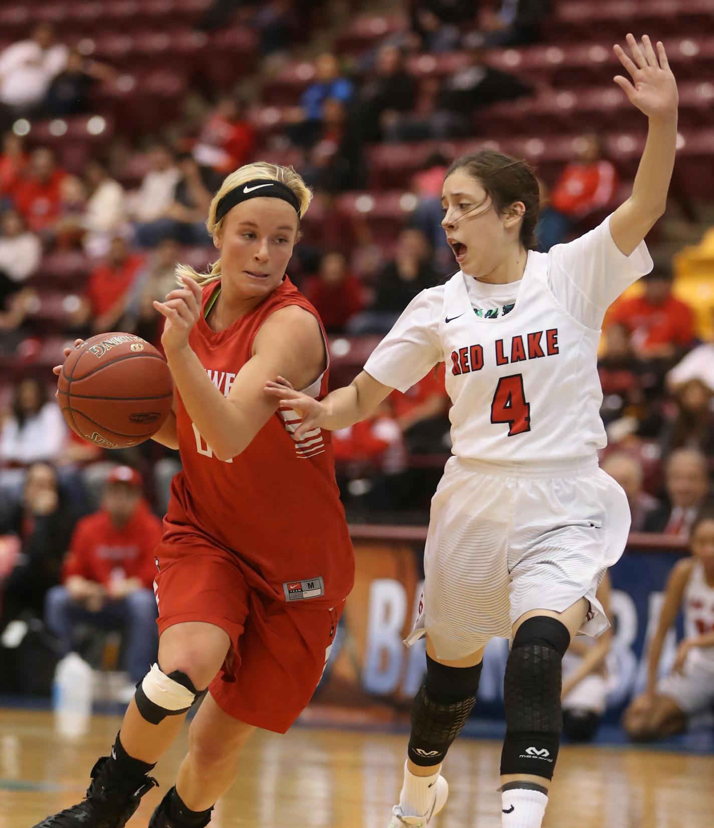 Cheslea Swatek(21) dribbles past a guarding Kaylynn Chaboyea(4) of Red Lake.] in the quarterfinals between Redline and Cromwell-Wright in 1A at Mariucci Arena. Richard Tsong-Taatarii/ richard.tsong-taatarii@startribune.com