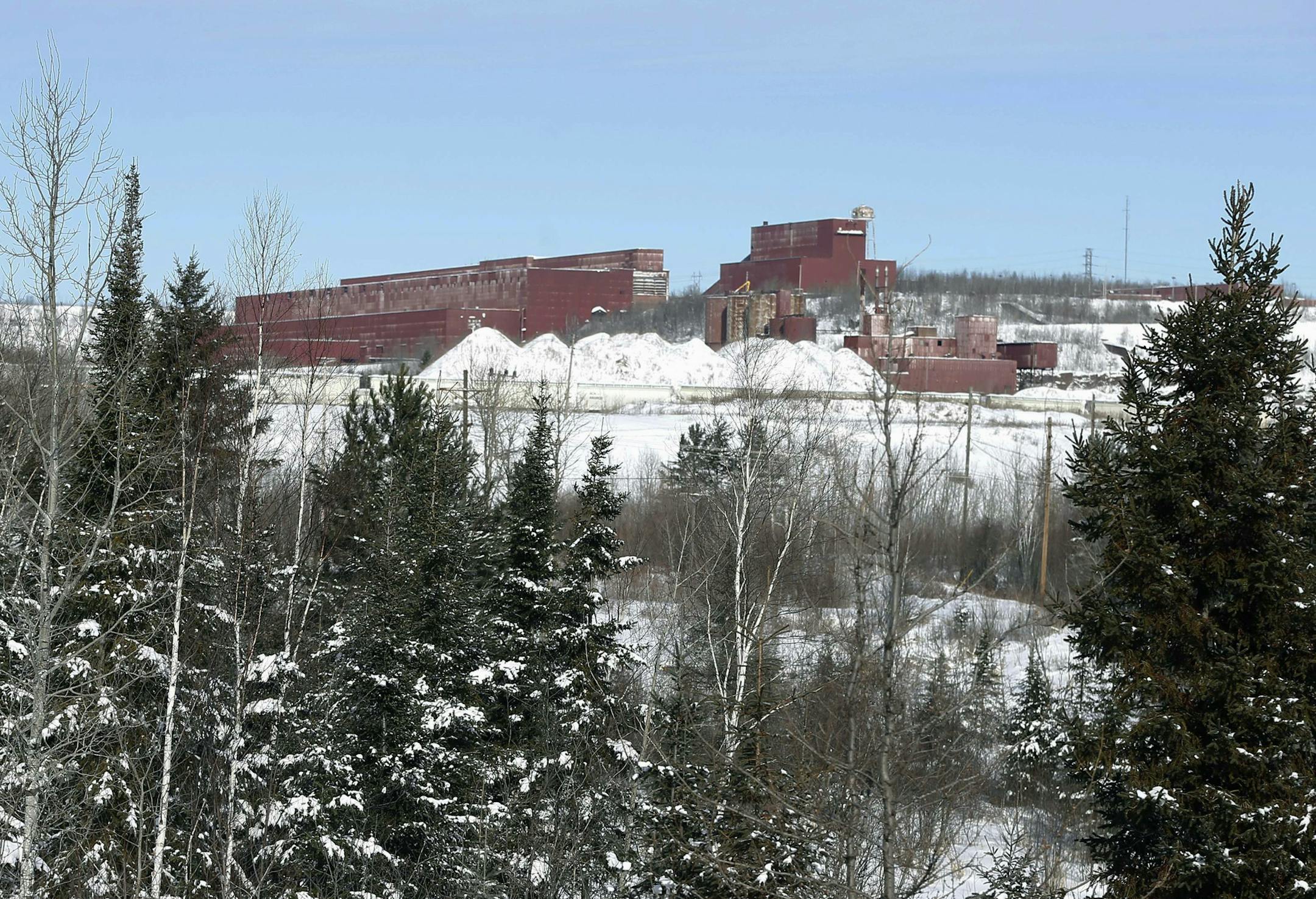 FILE - In this Feb. 10, 2016, file photo the closed LTV Steel taconite plant is seen near Hoyt Lakes, Minn. The prospect remains of returning the site, which was closed in 2000, to operation as part of Minnesota's first copper-nickel mine owned by PolyMet. U.S. Rep. Rick Nolan has introduced a bill to force completion of a land swap needed for the proposed PolyMet mine. (AP Photo/Jim Mone)
