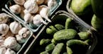 At the Midtown Farmer's Market, local healthful grown cucumbers and garlic are available for community member to buy with SNAP benefits (formerly know