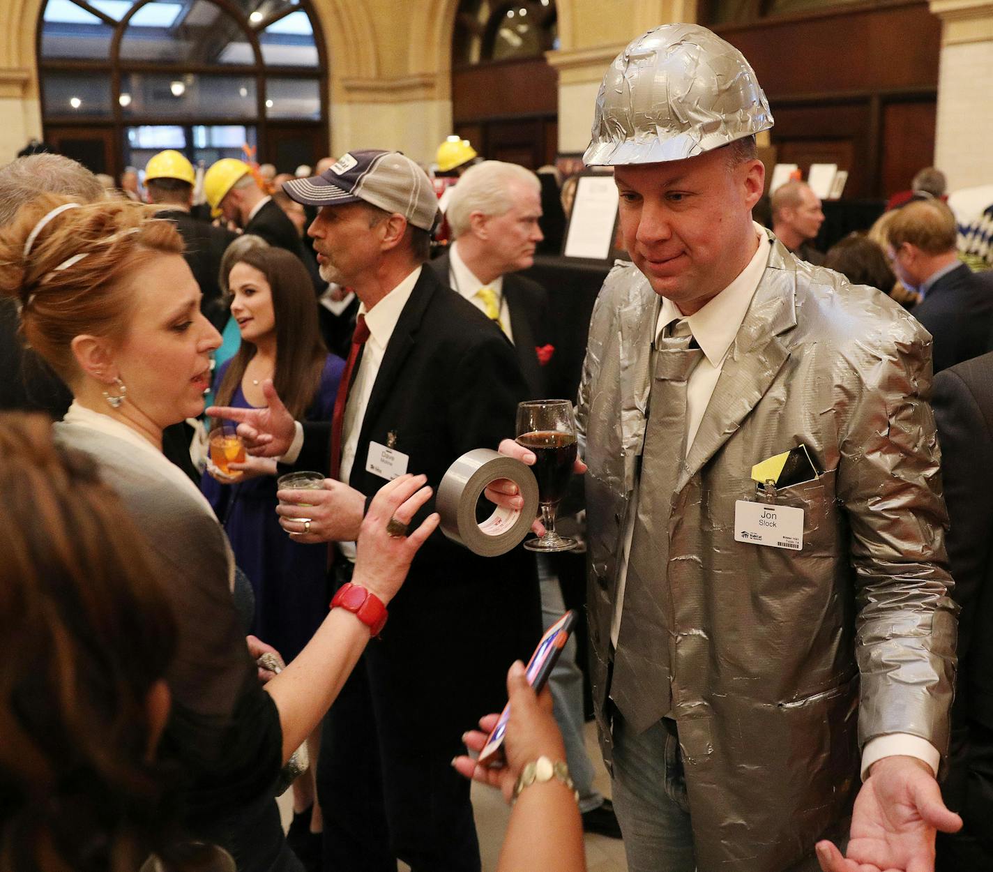 Jon Slock got several looks and requests for photos as he sported a duct tape suit. ] ANTHONY SOUFFLE &#xef; anthony.souffle@startribune.com The Twin Cities Habitat for Humanity hosted its annual Hard Hat & Black Tie Gala Saturday, April 7, 2018 at The Depot in Minneapolis.