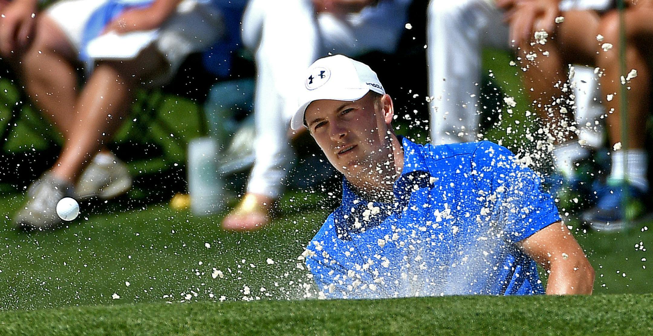 Jordan Spieth found sand early in his round, on No. 2, and he found little success until closing with three birdies in four holes.
