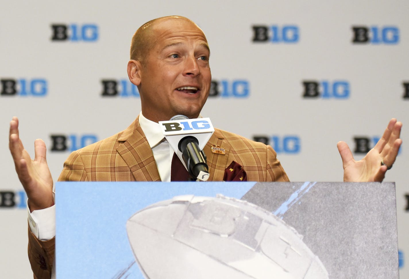 CORRECTS DATE - Minnesota NCAA college football head coach P.J. Fleck speaks at Big Ten Media Day in Chicago, Tuesday, July 25, 2017. (AP Photo/G-Jun Yam)