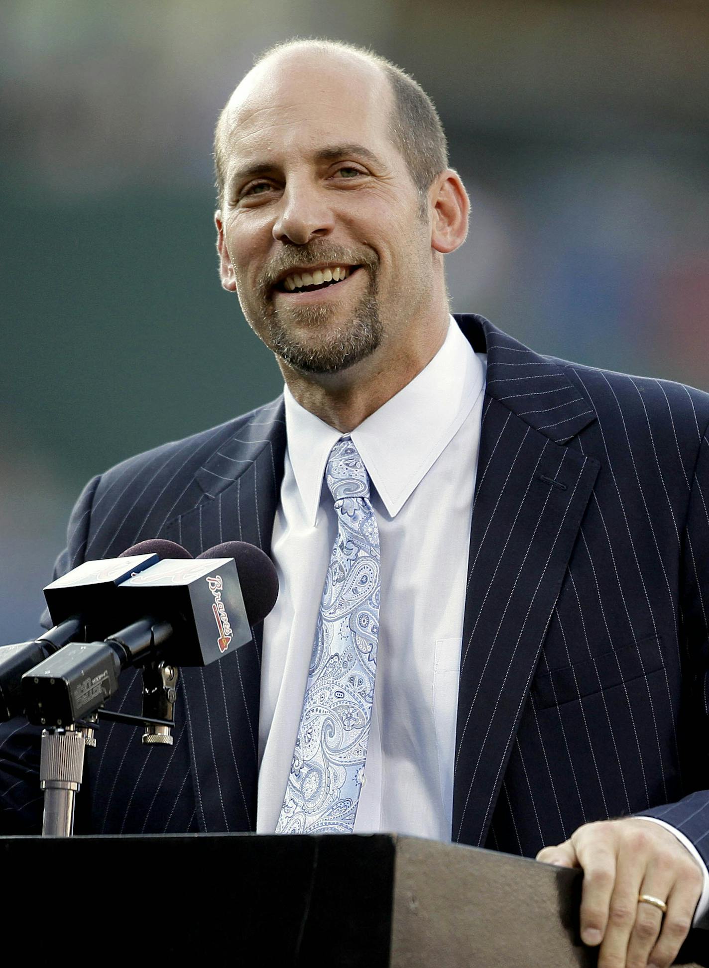 Former Atlanta Braves pitcher John Smoltz speaks during a ceremony retiring his jersey before a baseball game between the Braves and the Toronto Blue Jays, Friday, June 8, 2012, in Atlanta. Smoltz took his place in Braves history on Friday night when the team retired his No. 29. He was inducted into the Braves Hall of Fame earlier in the day. (AP Photo/David Goldman) ORG XMIT: GADG102