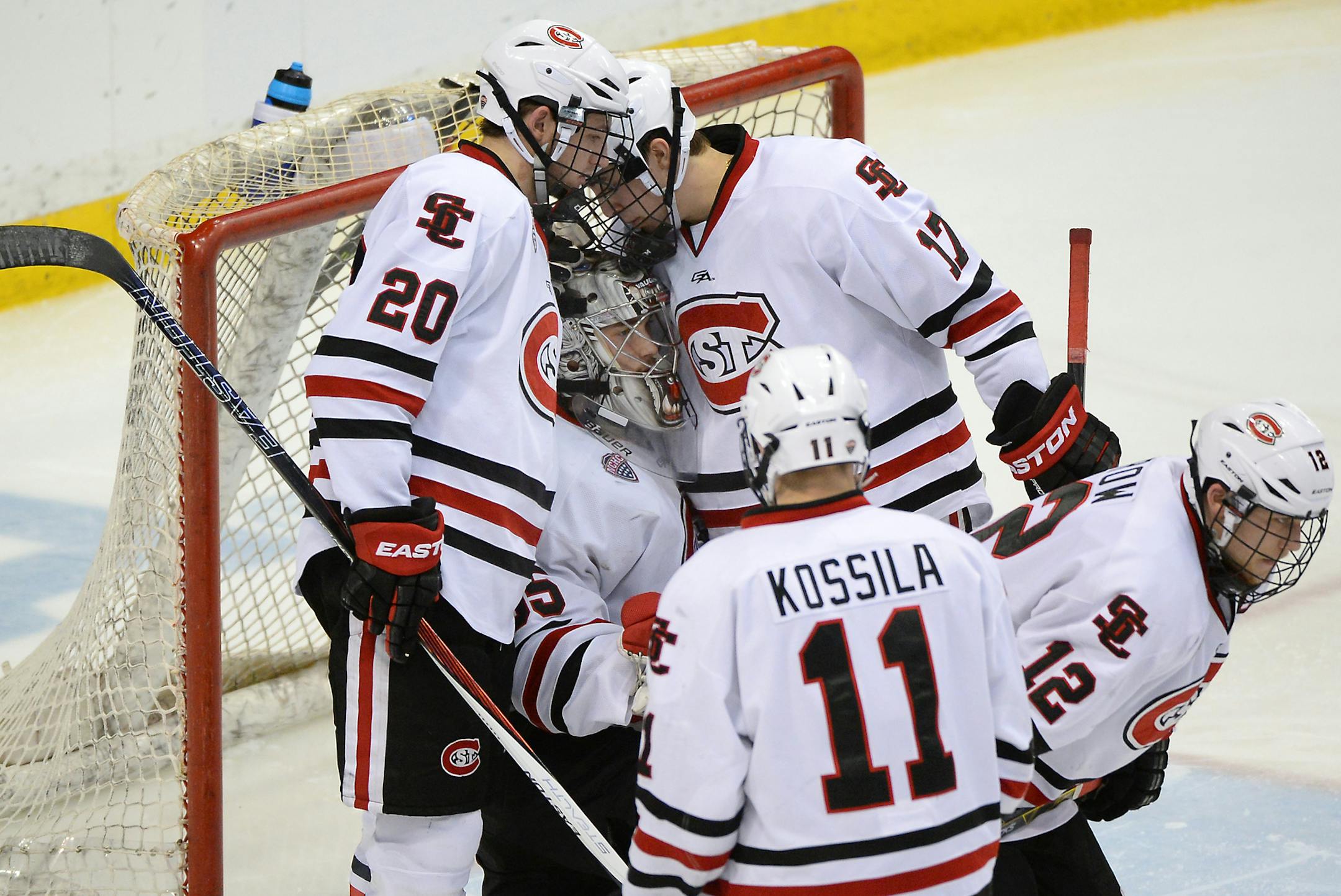 St. Cloud State Huskies players were dejected after falling to the Ferris State Bulldogs in overtime 5-4 Saturday. ] (AARON LAVINSKY/STAR TRIBUNE) aaron.lavinsky@startribune.com St. Cloud State University played Ferris State in the first round of the 2016 NCAA Division I Men's West Regional Hockey Tournament on Saturday, March 26, 2016 at Xcel Energy Center in St. Paul.