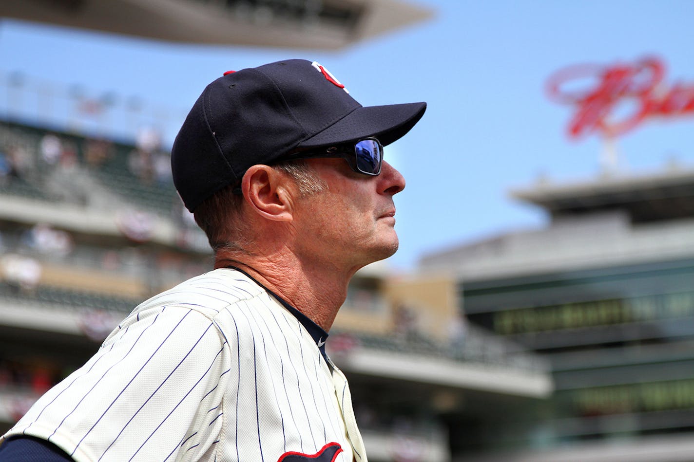 Twins skipper Paul Molitor looks over the field during the National Anthem before his team played the Cleveland Indians at Target Field on Saturday, April 18, 2015.