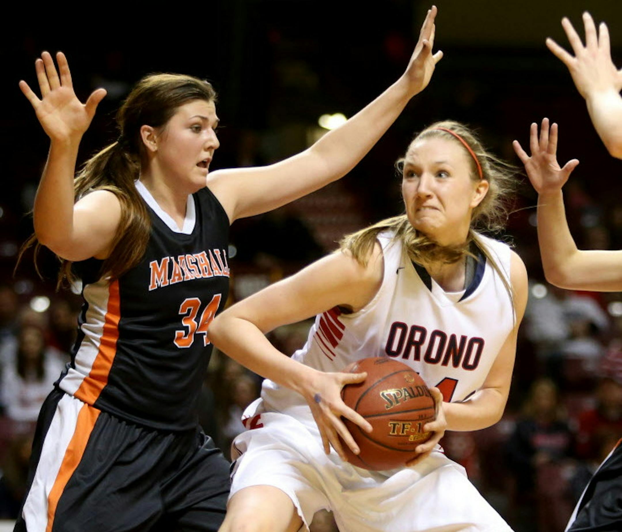 Orono center Meghan Mandel (44) drives to the basket against Marshall's Morgan Saustad (34) and Gabby Hess (32) during the first half of the Class 3A girls basketball semifinals at Williams Arena Thursday, March 19, 2015, in Minneapolis, MN.](DAVID JOLES/STARTRIBINE)djoles@startribune.com Class 3A girls basketball semifinals at Williams Arena Thursday, March 19, 2015, in Minneapolis, MN. ORG XMIT: MIN1503191357453971