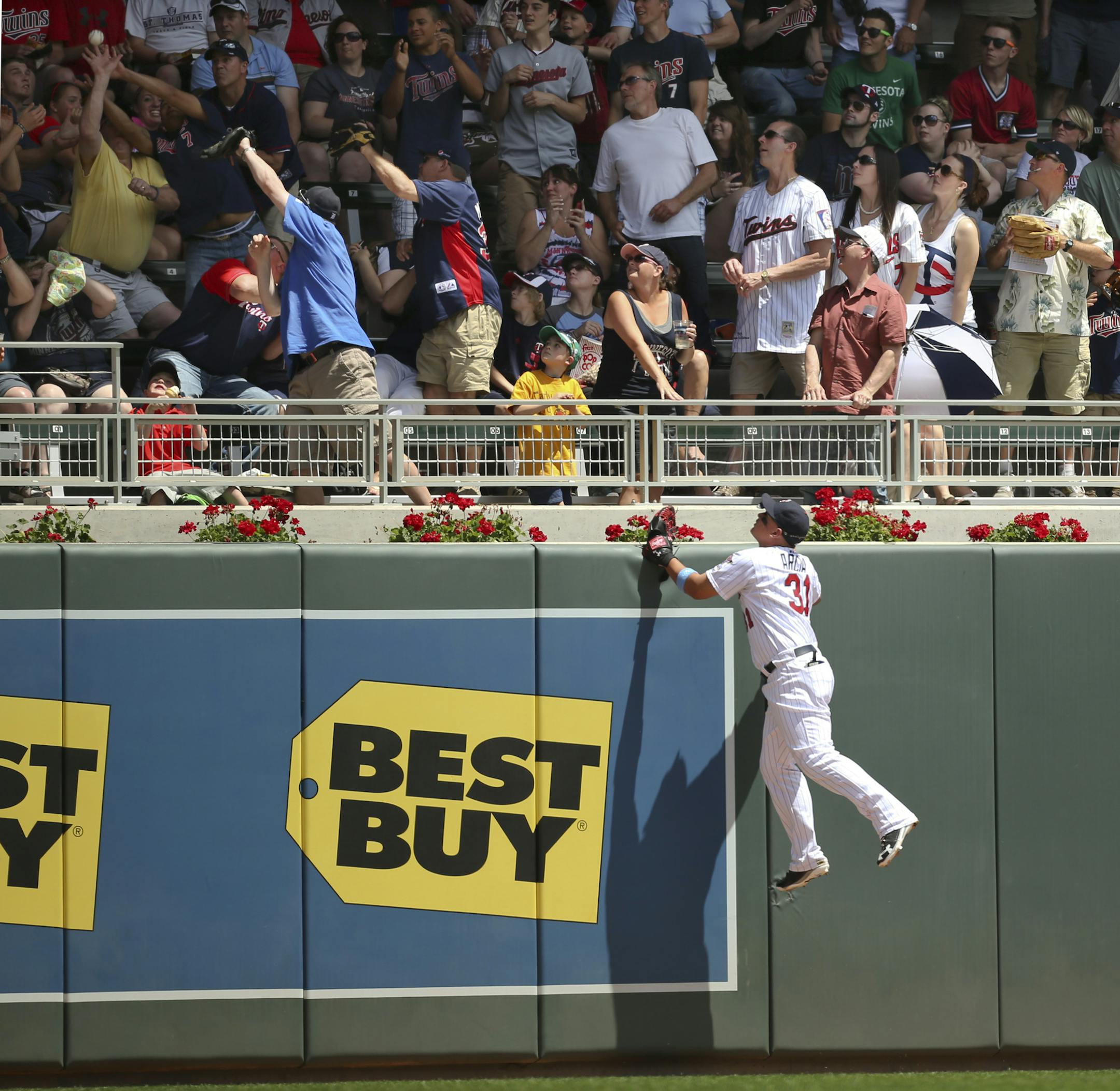 The MInnesota Twins closed out a series against the Detroit Tigers Sunday afternoon, June 16, 2013 at Target Field in Minneapolis. All that Twins left fielder Oswaldo Arcia could do was watch as Torii Hunter's two run homer landed several rows back in left field in the first inning. The hit was Hunter's 300th career homer. ] JEFF WHEELER ‚Ä¢ jeff.wheeler@startribune.com