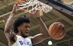 FILE - In this Jan. 27, 2018, file photo, Duke's Marvin Bagley III (35) dunks the ball during the first half of an NCAA college basketball game agains
