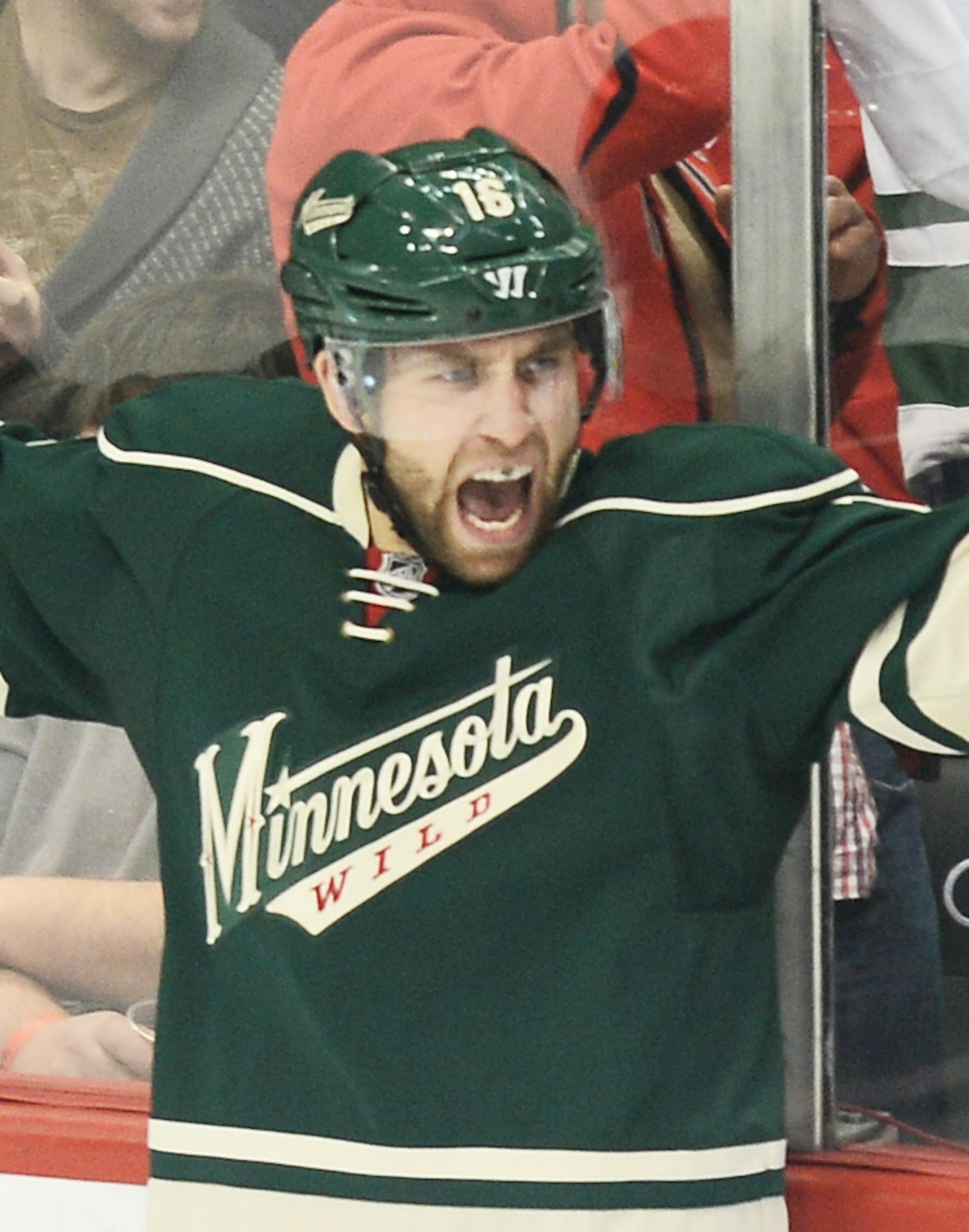 Minnesota Wild left wing Jason Zucker (16) with defenseman Jared Spurgeon (46) after Zucker scored a goal against Chicago :18 seconds into the game Friday. ] (AARON LAVINSKY/STAR TRIBUNE) aaron.lavinsky@startribune.com The Minnesota Wild play the Chicago Blackhawks on Friday, Oct. 30, 2015 at Xcel Energy Center in St. Paul, Minn.