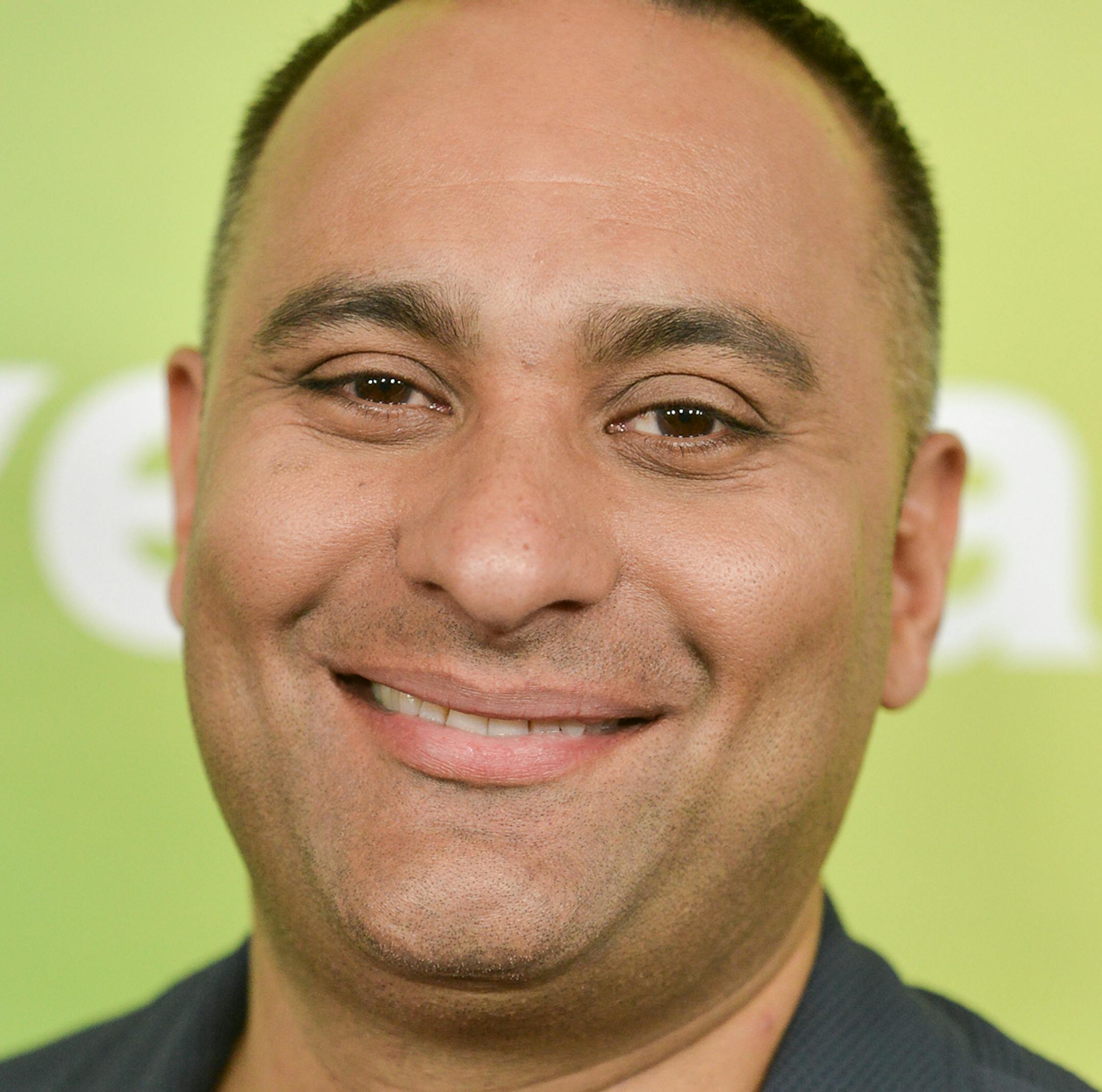 Russell Peters arrives at the NBC Universal Summer Press Day on Tuesday, April 8, 2014, in Pasadena, Calif. (Photo by Richard Shotwell/Invision/AP) ORG XMIT: INVW