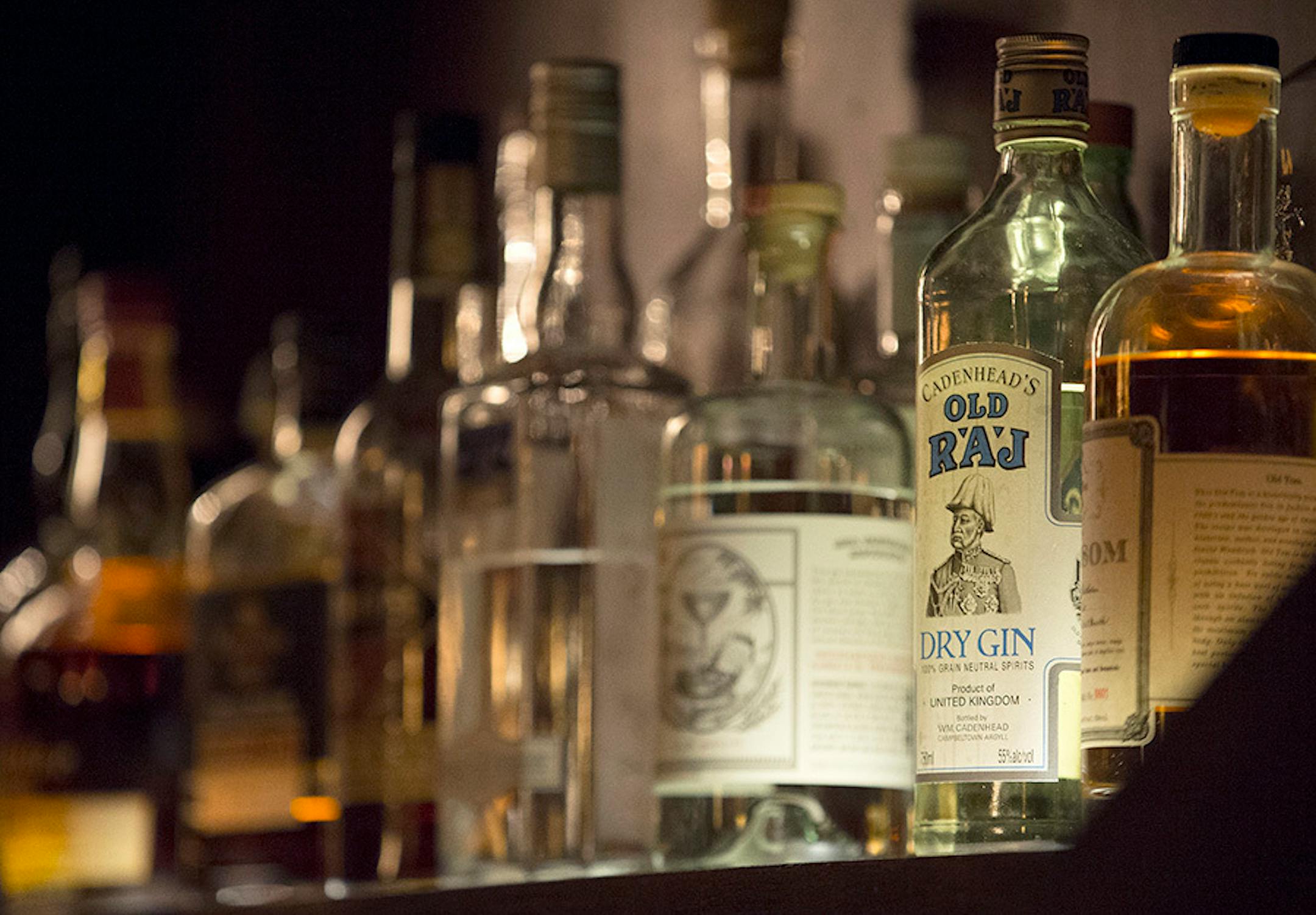 Alcohol on the bar shelves at Volstead's Emporium in Uptown.