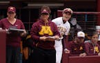 New Gophers head softball coach Piper Ritter (left, next to former head coach Jamie Trachsel in 2019) has served as pitching coach for three previous 