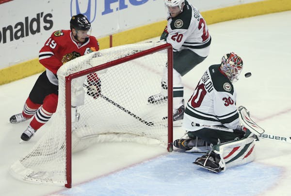 Minnesota Wild goalie Ilya Bryzgalov (30) makes a save during the third period of their game Sunday night at United Center in Chicago. ] JEFF WHEELER 