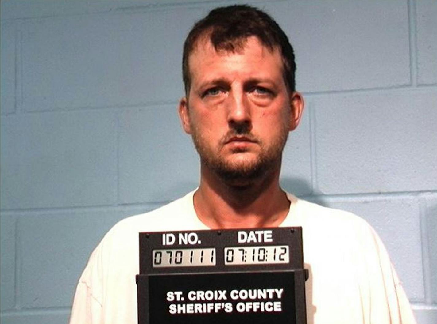 This photo provided by the St. Croix, Wis., County Sheriff's Office shows Aaron Schaffhausen who was under arrest Wednesday, July 11, 2012, and being held on suspicion of first degree intentional homicide, authorities said. Police found his three young daughters dead Tuesday in a house in River Falls, Wis., that officers said smelled of gas. Court record show that Shaffhausen and his wife divorced last year.