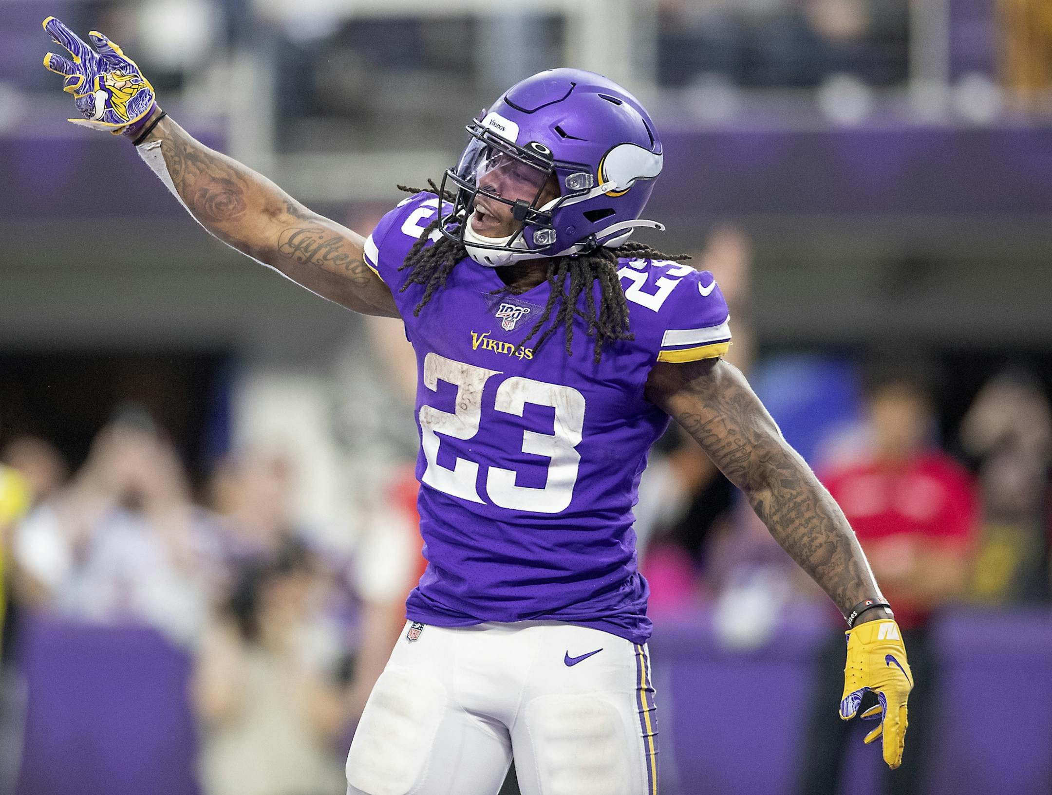 Minnesota Vikings running back Mike Boone celebrated his touchdown run in the fourth quarter.