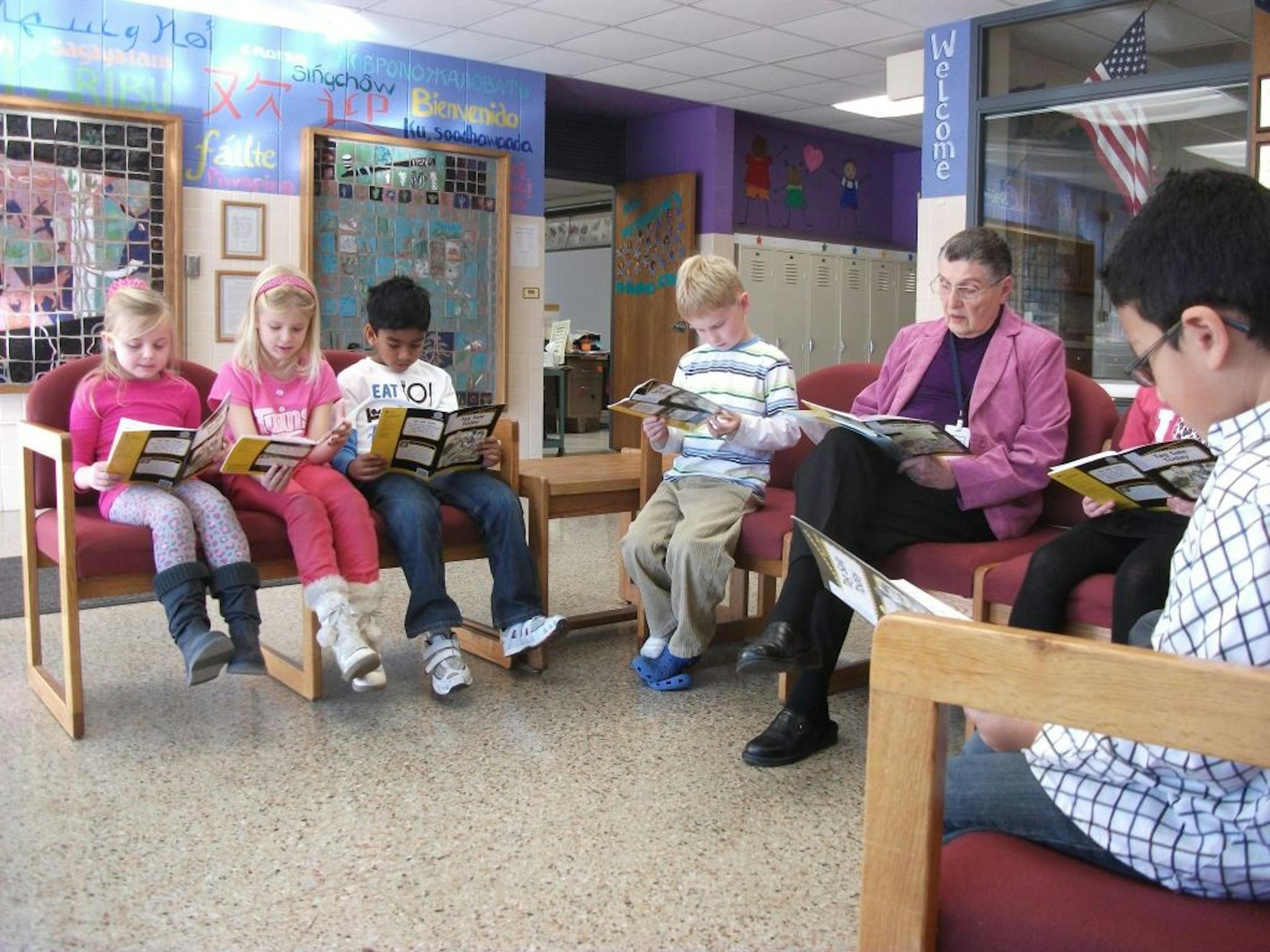 From left, Taylin Metcalfe, Lily Mead, Pranav Kalava, John Stokesbary, Virginia �Grammy Mac� McNear and Daniel Lozano read through the play �Tag Sale Today,� by Katherine Scraper. McNear, a longtime Foster Grandparent at Mankato's Kennedy Elementary School, was recently honored by the school on her 90th birthday.