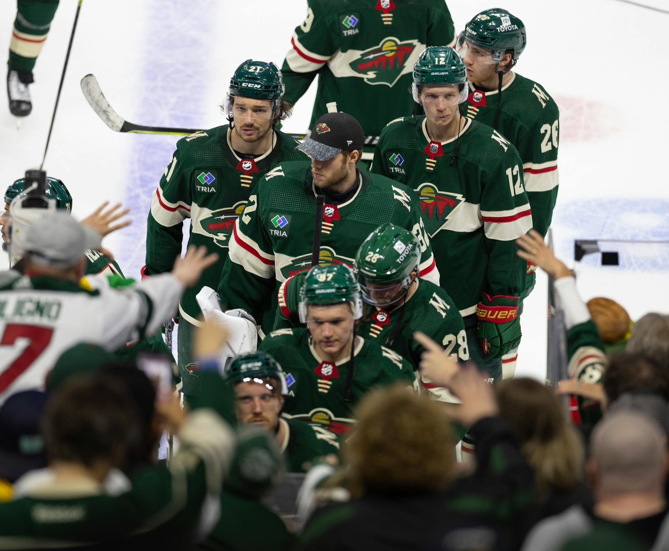 Players leave the ice after the Wild's elimination from the playoffs after the loss to Dallas.