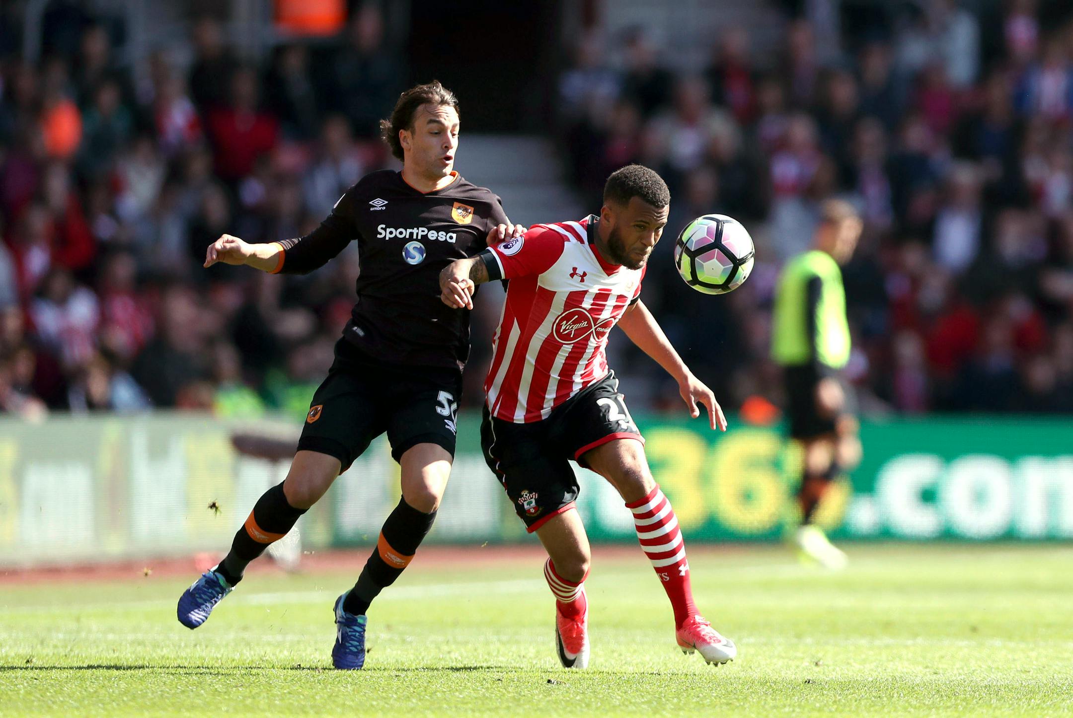 Southampton's Ryan Bertrand, right, and Hull City's Lazar Markovic