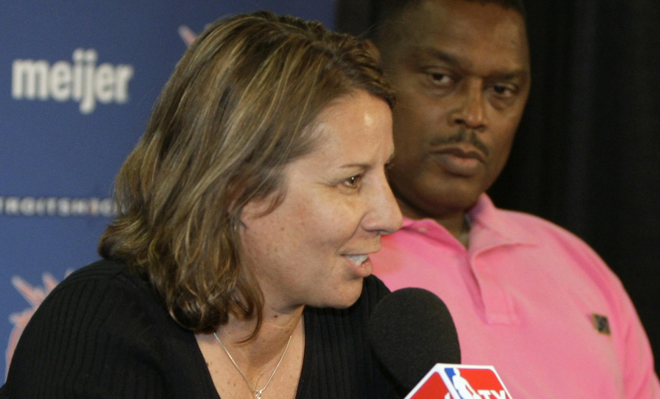 Detroit Shock assistant coach Cheryl Reeve speaks during a news conference as the team's new coach, Rick Mahorn, listens Monday, June 15, 2009, in Auburn Hills, Mich. Bill Laimbeer resigned Monday as coach of the WNBA basketball team. (AP Photo/Detroit Free Press, Julian H. Gonzalez) ** THE DETROIT NEWS OUT ** ORG XMIT: MIDTF105