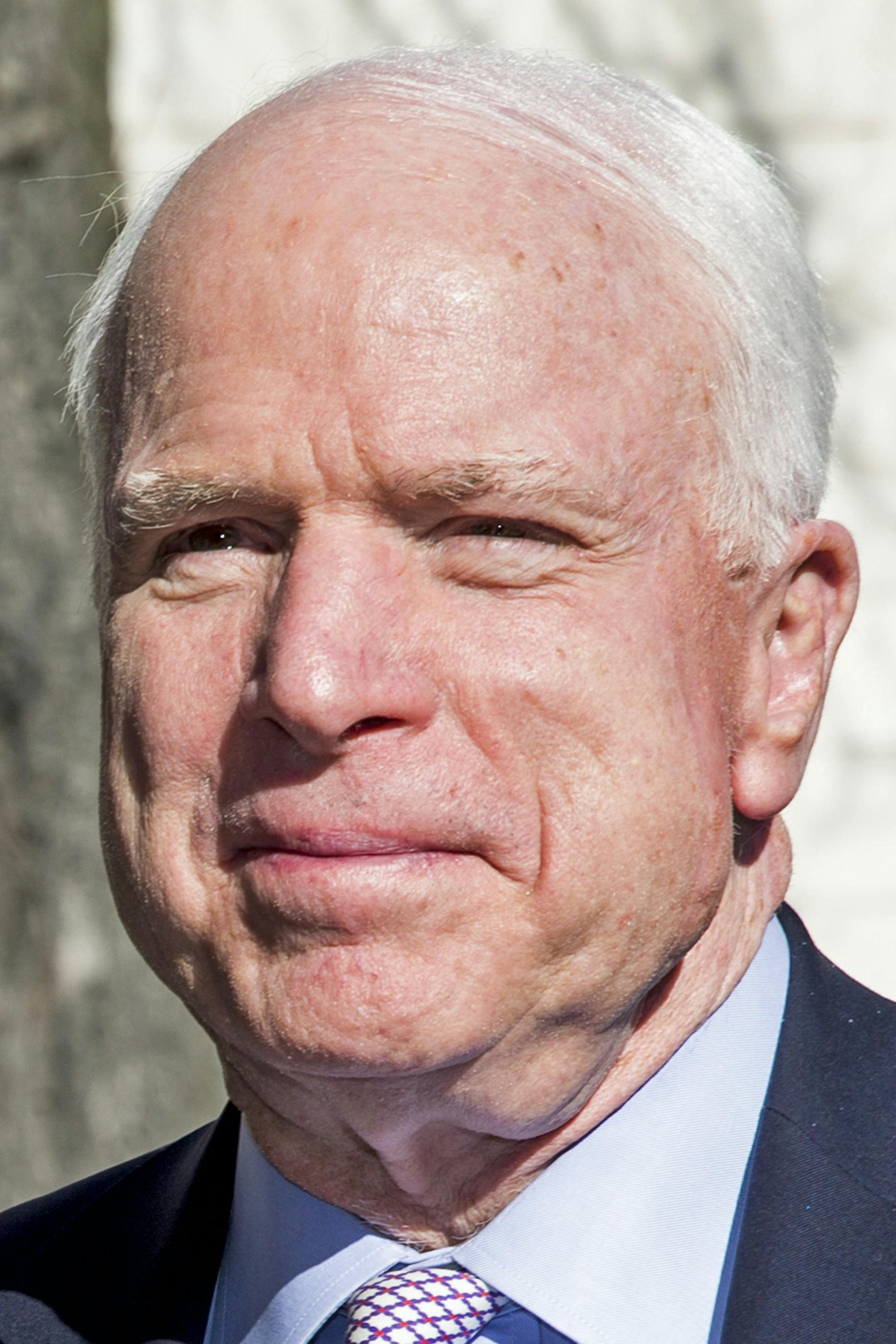 U.S. Senator John McCain, right, meets with Norwegian Minister of Defence, Ine Erik Soereide in Oslo Monday April 14, 2014. Russia and Ukraine were topics for discussion during their talks. (AP Photo/NTB Scanpix, Erlend Aas) NORWAY OUT