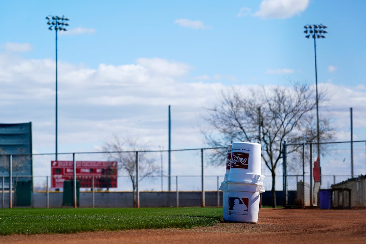 A practice field at the Cincinnati Reds spring training complex sits empty as pitchers and catchers are not starting spring training workouts as scheduled as the Major League Baseball lockout enters its 77th day and will prevent pitchers and catchers from taking the field for the first time since October Wednesday, Feb. 16, 2022, in Goodyear, Ariz. (AP Photo/Ross D. Franklin)