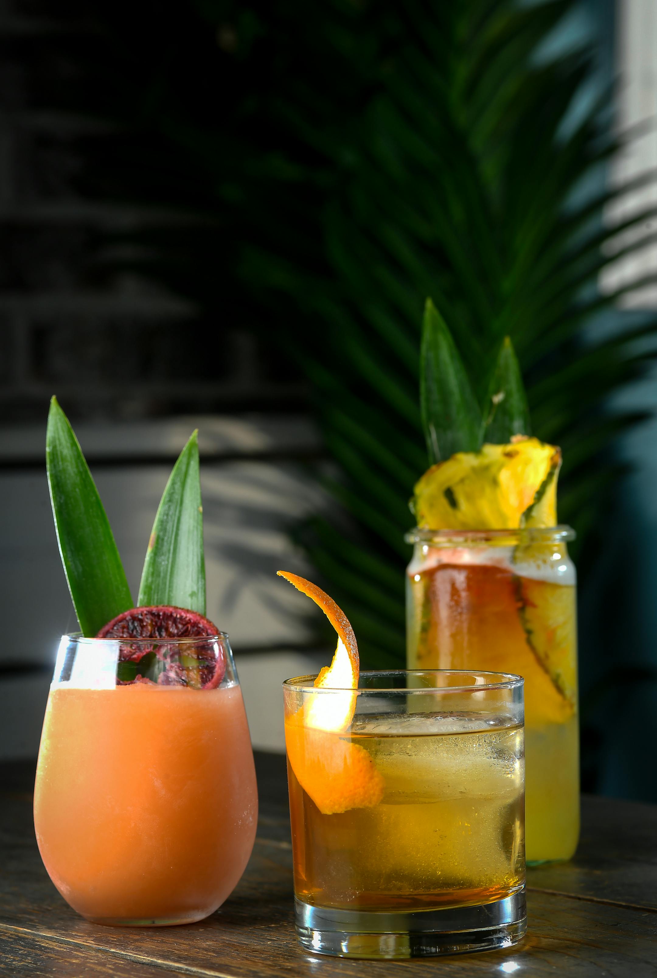 An assortment of Hola Arepa’s rum-based cocktails. From left, the You Can Rum, But You Can’t Hide, the Hola Fashioned and the Locked Up Abroad.