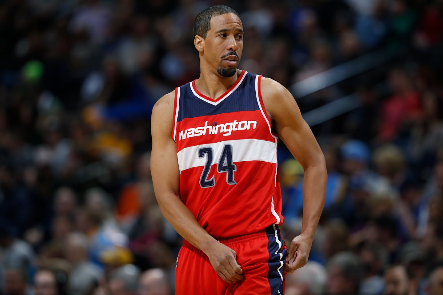 Washington Wizards guard Andre Miller takes the court against the Denver Nuggets in the first quarter of an NBA basketball game Sunday, Jan. 25, 2015, in Denver. (AP Photo/David Zalubowski)