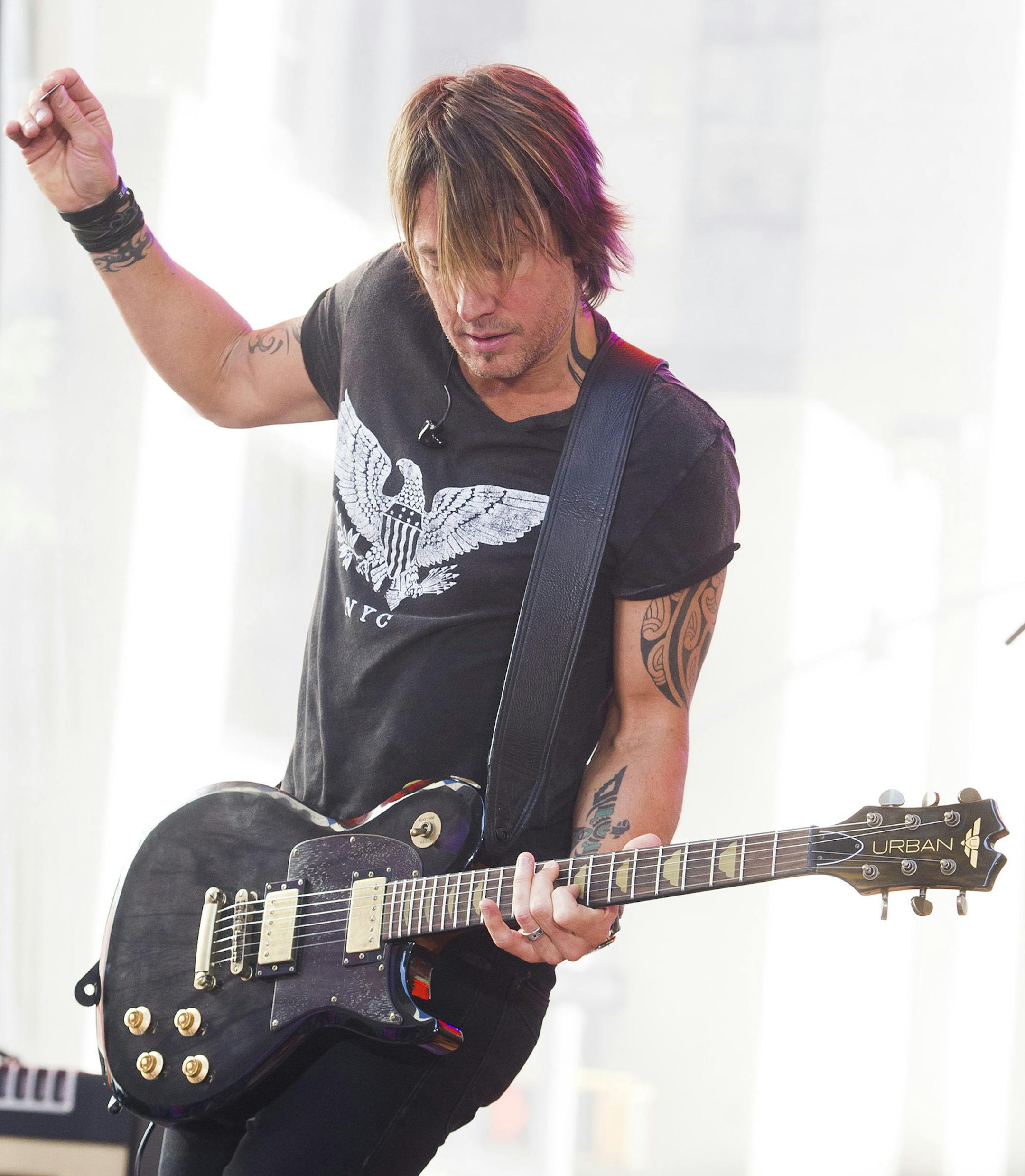 Keith Urban performs on NBC's "Today" show on Friday, Aug. 7, 2015 in New York. (Photo by Charles Sykes/Invision/AP)