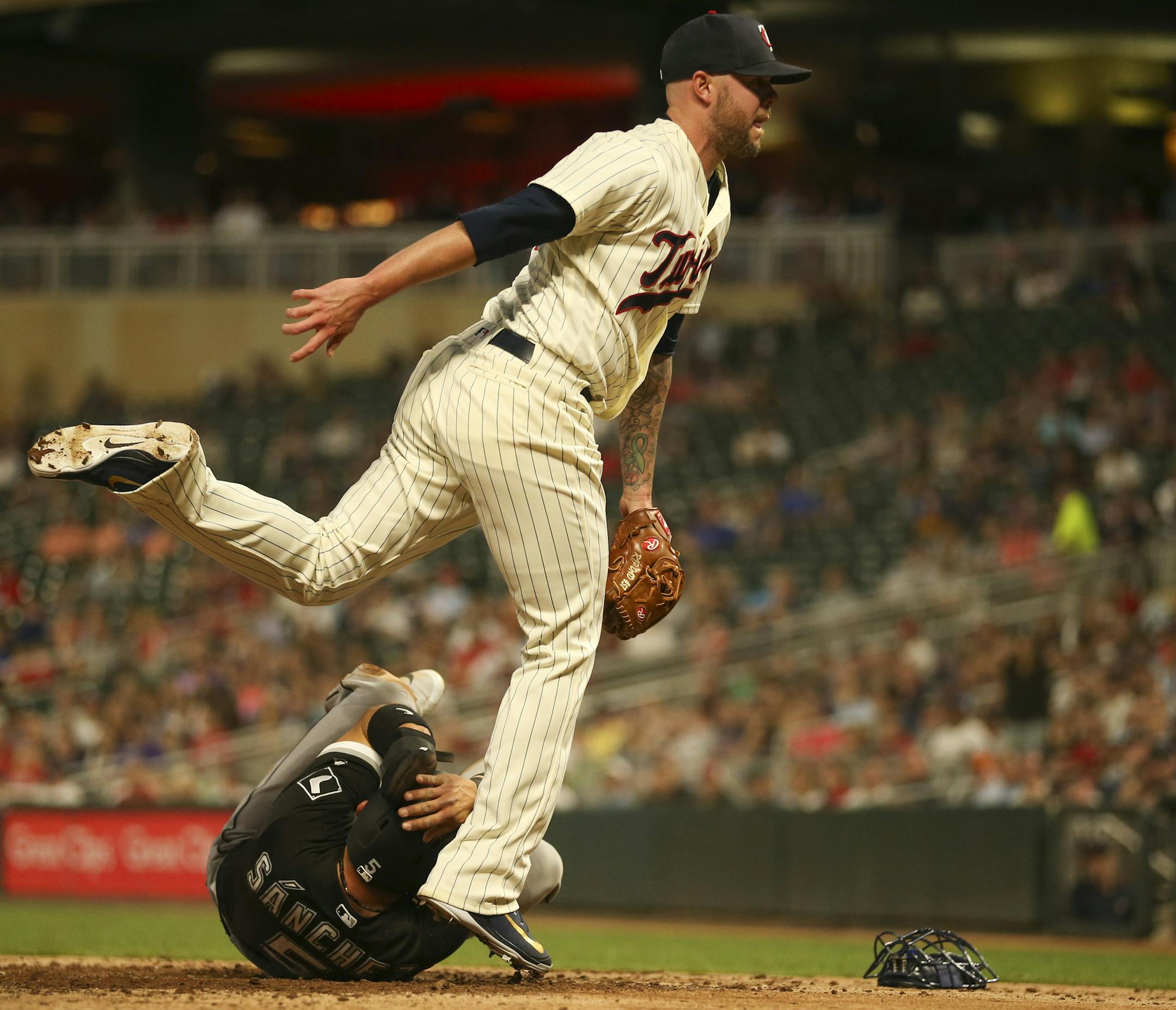 Chicago White Sox third baseman Yolmer Sanchez (5) tied the game at 2-2 when he scored in the sixth inning on a wild pitch by Minnesota Twins relief pitcher Ryan Pressly (57), who was covering home while catcher Mitch Garver chased down the ball. ] JEFF WHEELER ï jeff.wheeler@startribune.com The Minnesota Twins continued their series with the Chicago White Sox Wednesday night, June 6, 2018 at Target Field in Minneapolis.