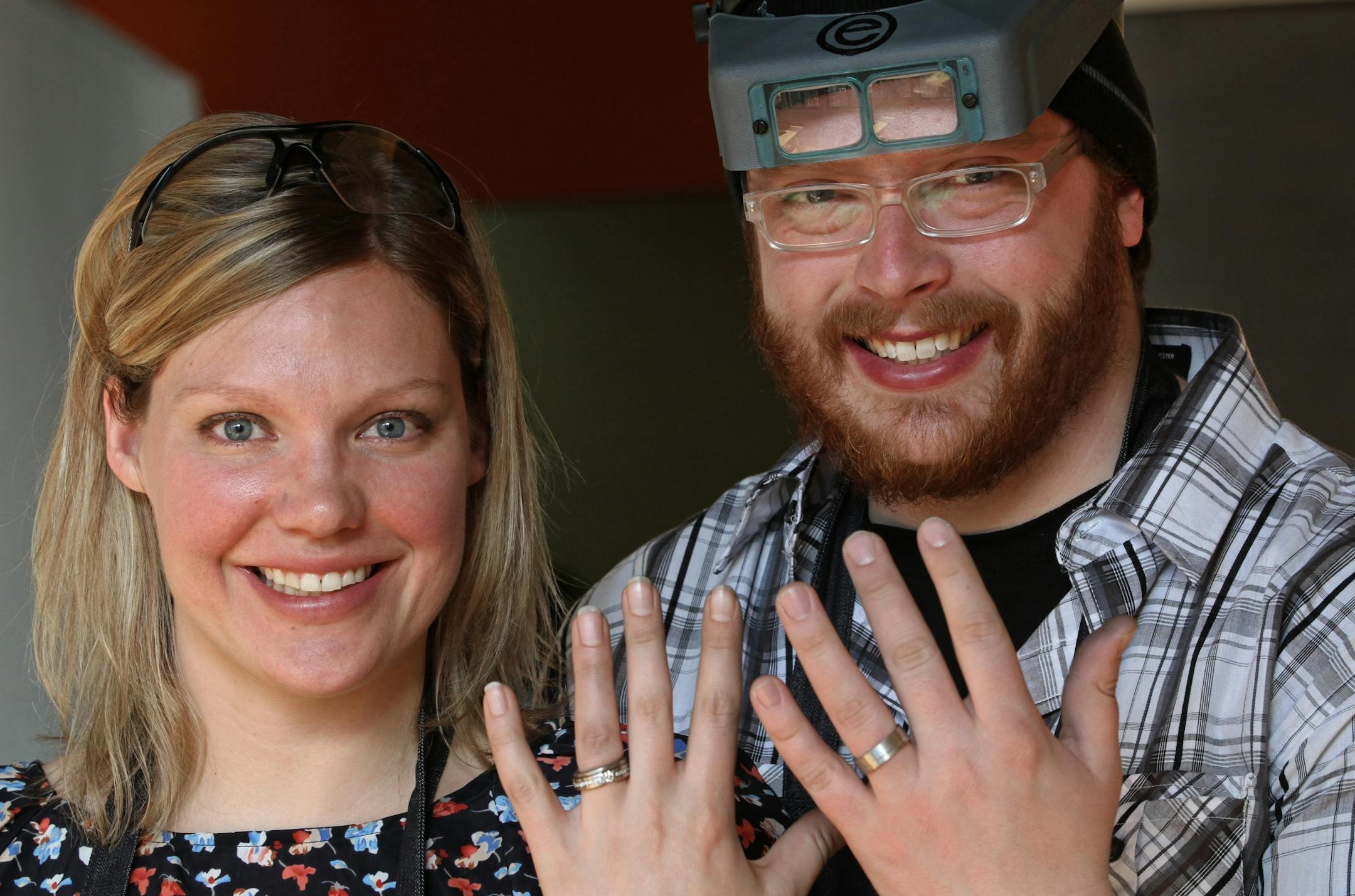 (left to right) Tess Haun and Jake Nyberg showed off their wedding rings that they were making during a day long process at the Steven Vincent Design workshop studio on 2/4/12.