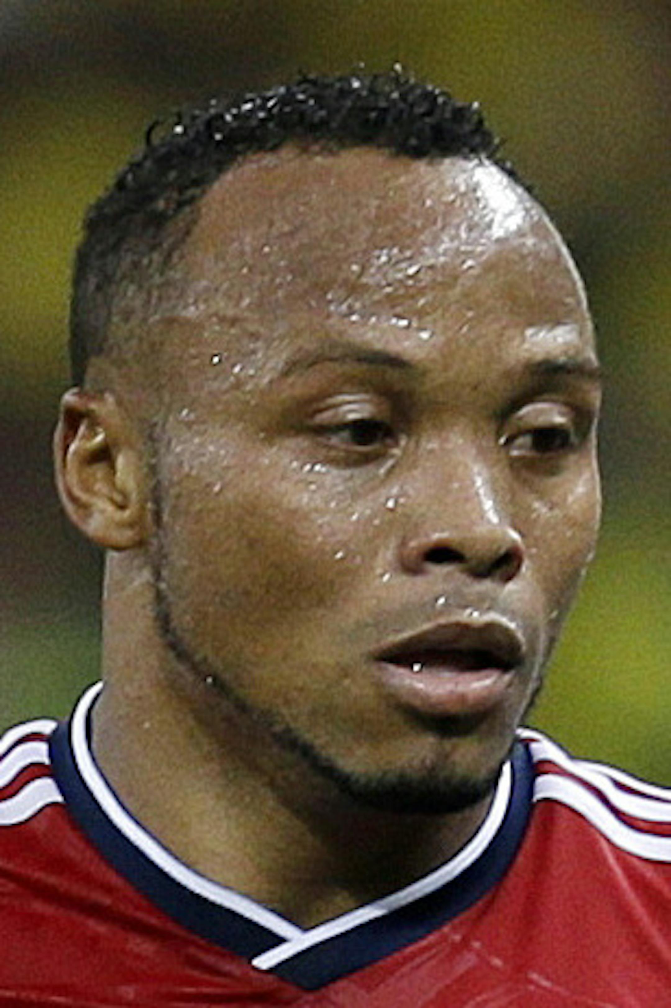 Colombia's Juan Zuniga waits to get the ball as Brazil's coach Luiz Felipe Scolari yells instructions to his players during the World Cup quarterfinal soccer match between Brazil and Colombia at the Arena Castelao in Fortaleza, Brazil, Friday, July 4, 2014. Brazil defeated Colombia 2-1 to advance to the semifinals. (AP Photo/Natacha Pisarenko)