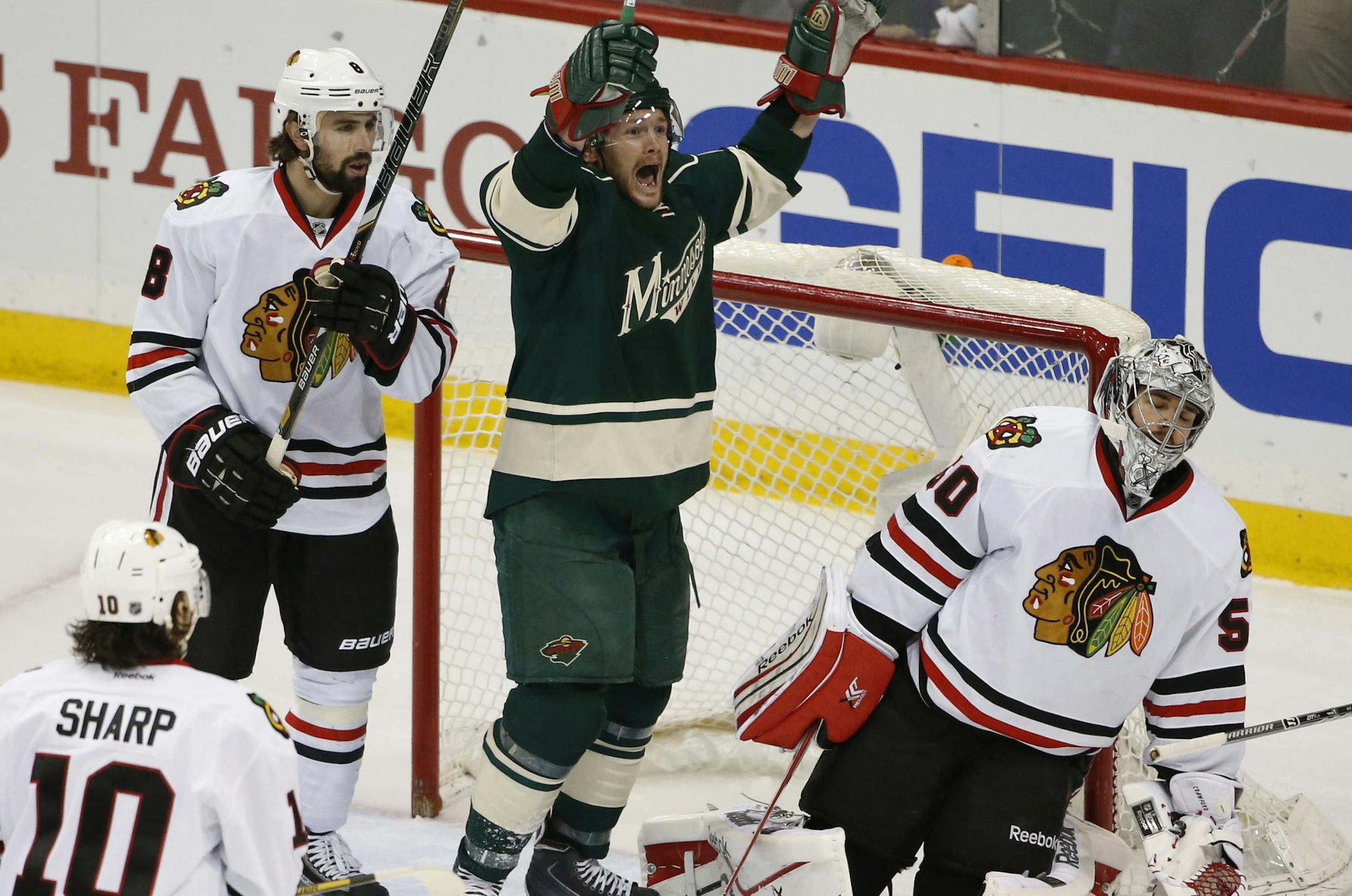 Minnesota Wild left wing Matt Cooke (24) celebrated after the Wild scored during first period action. ] CARLOS GONZALEZ cgonzalez@startribune.com - May 9, 2014, St. Paul, Minn., Xcel Energy Center, NHL, Minnesota Wild vs. Chicago Blackhawks, Stanley Cup Playoffs Round 2, Game 4