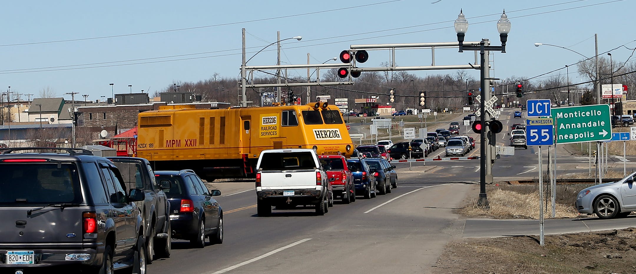 A Canadian Pacific train rolled thru the intersection of Highwaay 55 and Central Avenue in Bullalo, MN. ] JOELKOYAMA‚Ä¢jkoyama@startribune Buffalo, MN on April 10, 2014. Folks in Buffalo, Minn., are running late for just about everything these days, because the city's four railroad crossings are so frequently blocked by trains. One train blocked two of them for 16 hours in November after it stopped with mechanical trouble and then its crew went home (its shift ended). Traffic ha
