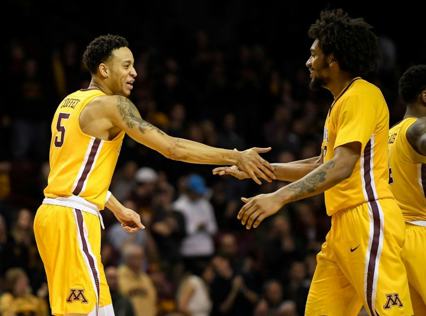 Amir Coffey (left) and Jordan Murphy