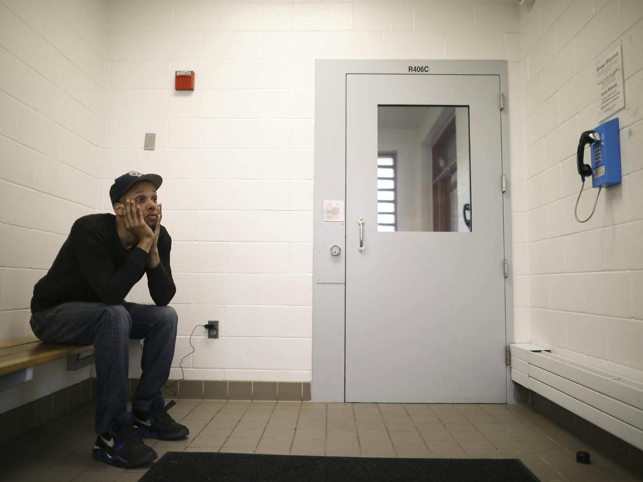 Damien Agboola waited for a cab to pick him up after being released from the Dakota County jail Wednesday afternoon. ] JEFF WHEELER ï jeff.wheeler@startribune.com After being released from the Dakota County jail, many former inmates want to get on with their lives -- but some find they can't even get out of Hastings. Damien Agboola of St. Paul, who was released Wednesday afternoon, May 10, 2017, had money for a cab, but not the $50 the driver said the faire would be to the Apple Valley tran