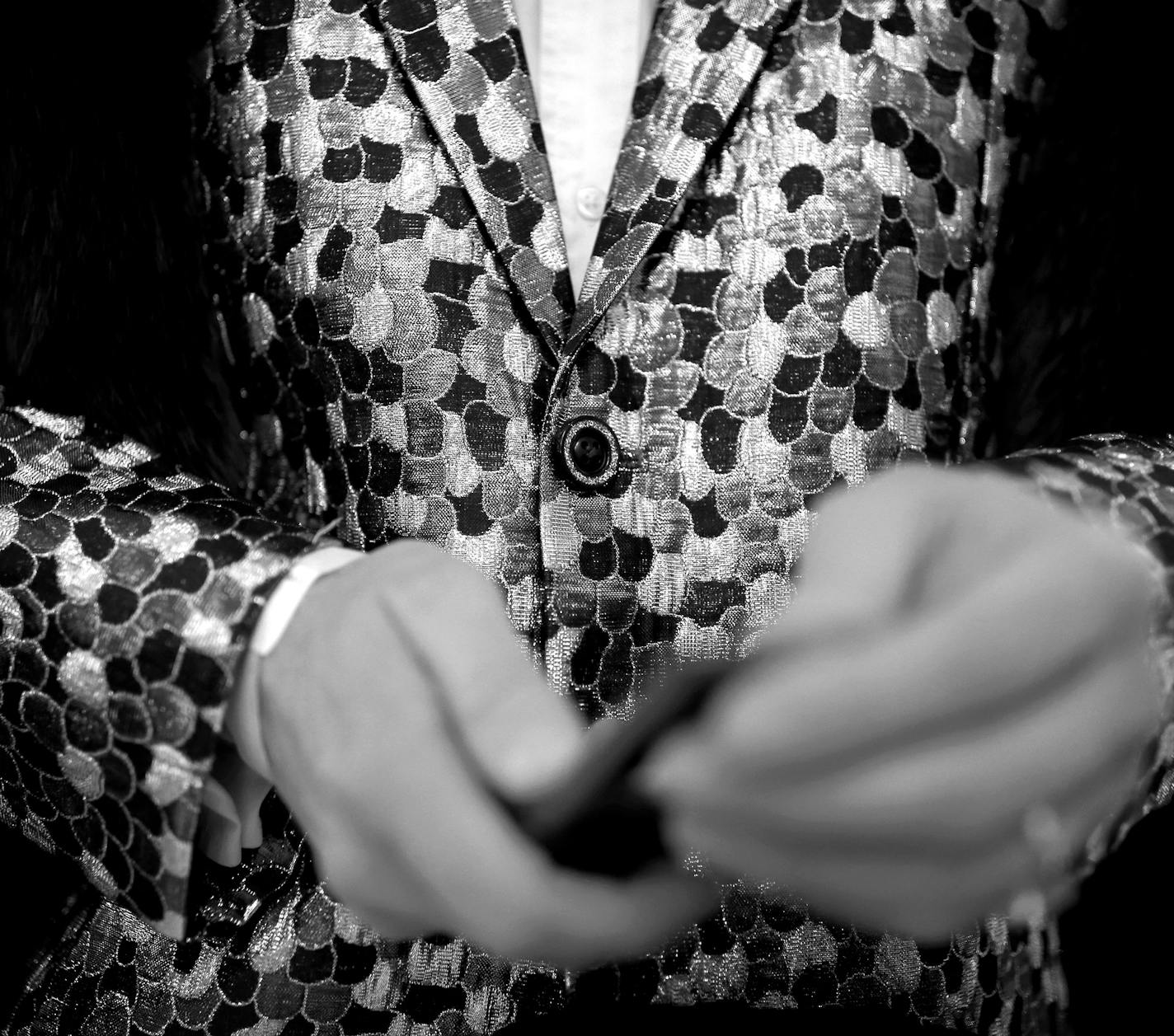 Chris Hanson of Minneapolis checked his phone at Orchestra Hall during the Envision Spring 2016 fashion show. ] CARLOS GONZALEZ cgonzalez@startribune.com - April 9, 2016, Minneapolis, MN, Orchestra Hall, Minnesota Fashion Week, ENVISION SPRING 2016