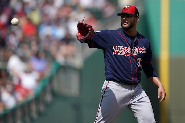 Minnesota Twins pitcher Martin Perez (33) got the ball back after he delivered a pitch during Sunday's game. ] ANTHONY SOUFFLE &#x2022; anthony.souffl