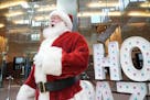 Santa stopped by a Holidazzle kickoff event featuring holiday music and treats Wednesday at the IDS Crystal Court in downtown Minneapolis.