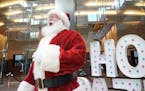 Santa stopped by a Holidazzle kickoff event featuring holiday music and treats Wednesday at the IDS Crystal Court in downtown Minneapolis.