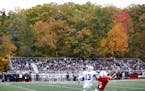 Fall colors were still hanging on during the a MIAC football battle of the Johnnies and Tommies in 2018. Football games, along with other fall sports,