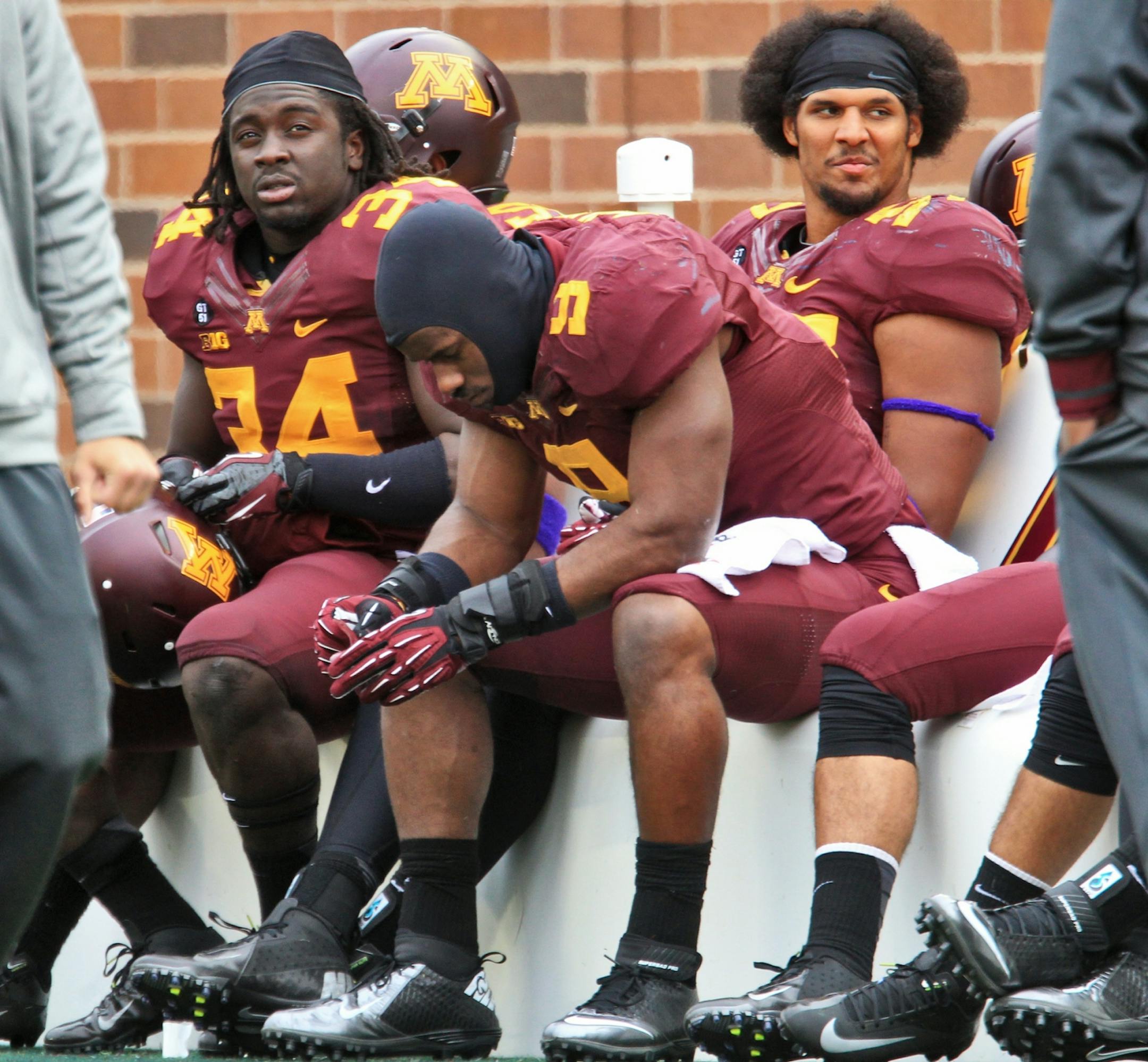 Gophers players on the bench during the final minutes of their 2012 loss to Michigan.