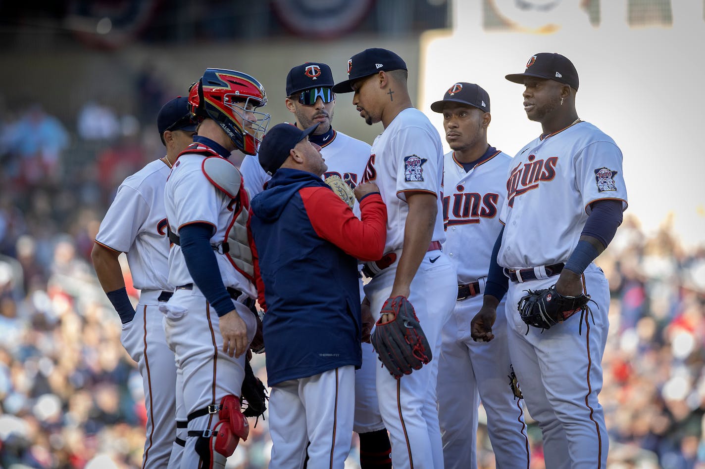 Twins pitching coach Wes Johnson (47) talks to Twins relief pitcher Jhoan Duran (59) on the mound during the top of the sixth inning on opening day at Target Field, in Minneapolis, Minn., on April 8, 2022. The Minnesota Twins take on the Seattle Mariners for their season opener. ] Elizabeth Flores • liz.flores@startribune.com