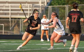 Sivanna O'Brien (15) leads Lakeville South in scoring.