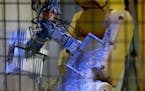 Robotics are used as well as manual labor in the manufacturing plant at Alexandria Industries, Wednesday, April 6, 2016 in Alexandria, MN. ] (ELIZABET
