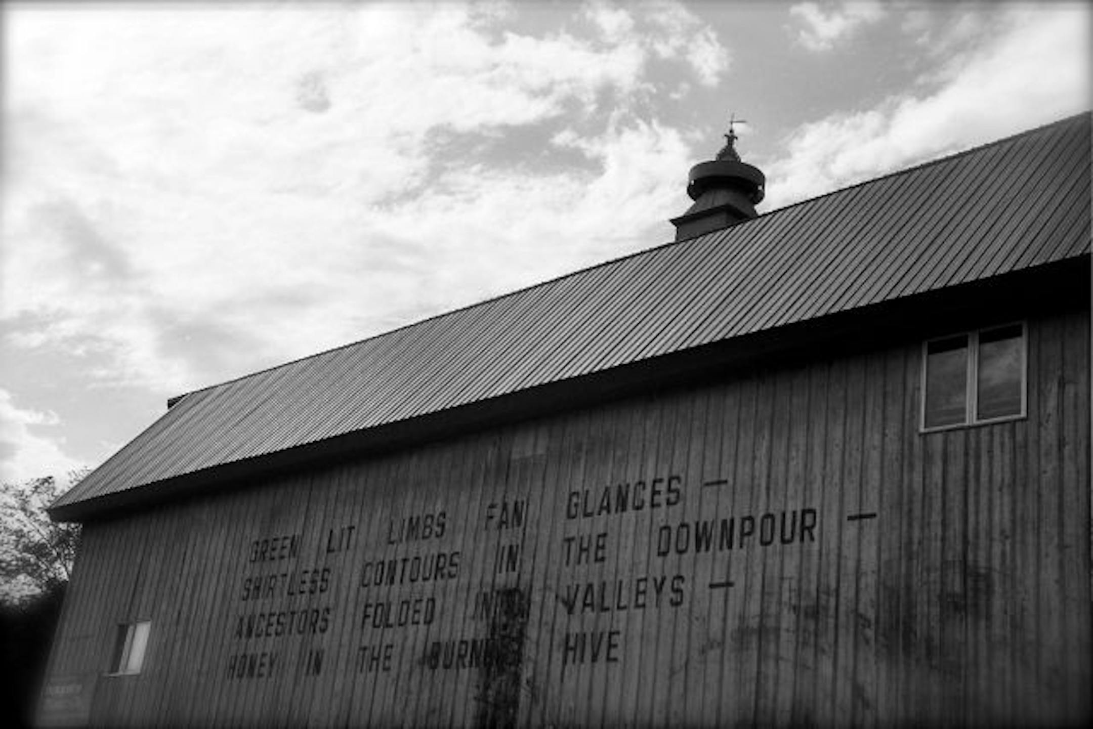 Summer's verse is clearly stamped on a repurposed barn on Hwy. 19 that is now home to Hobgoblin Music, a harp manufacturer.